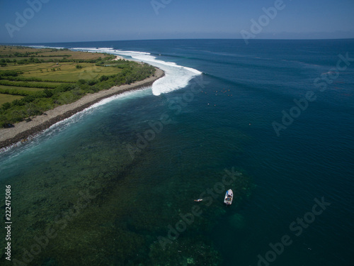 leaky peak perfection left hander cobblestone surfers drone aerial view sumbawa boat