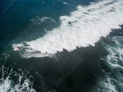 keramas bali right barrel spray indonesia aerial drone shot cutback spray surfer
