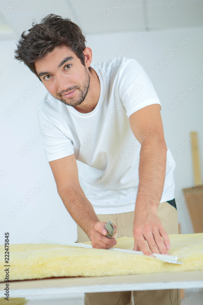 plasterer posing inside a building plasterer posing inside a building