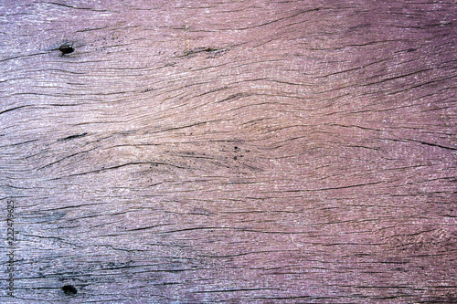 Old wood textured in purple tone for design background and all you inspirations