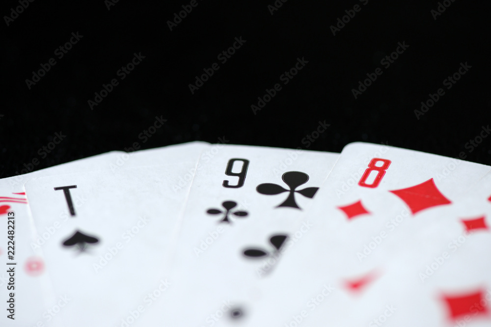 Playing cards on a dark background close up Playing cards on a dark background close up