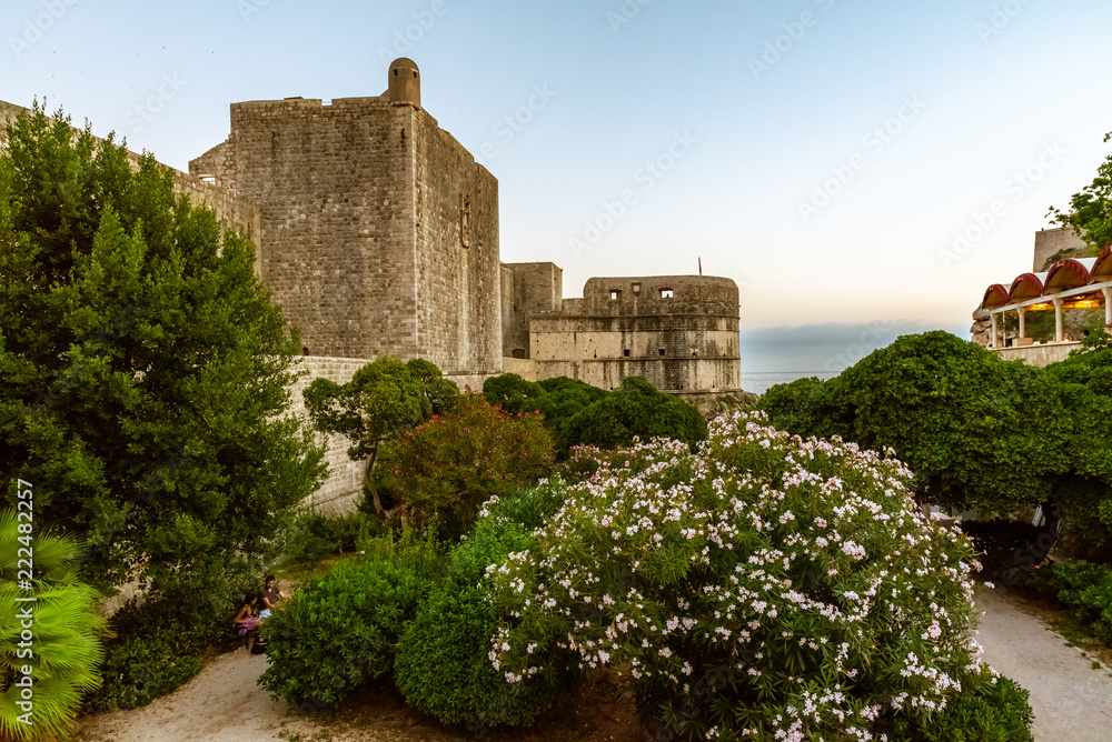 View to the ancient fortress Bokar and its garden on sunset