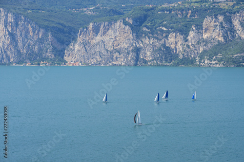 Sailboats on Lake Garda, one of the most popular Italian areas for water sports.