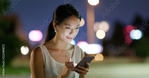 Woman use of mobile phone for online