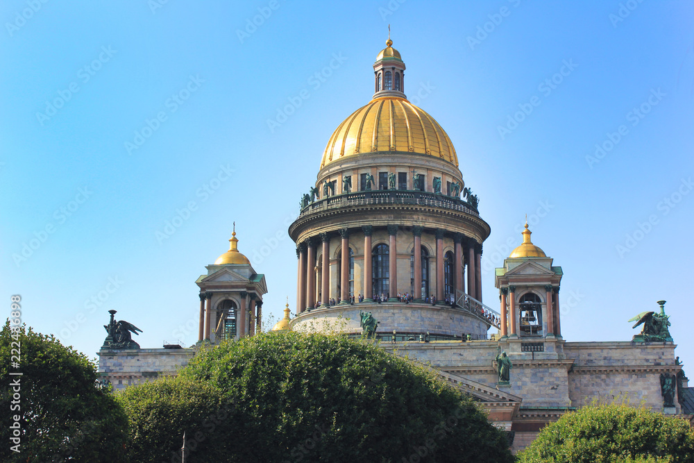 St. Isaac's Cathedral Facade Exterior in Saint Petersburg, Russia. Panoramic Summer Day Scene with World Famous Touristic Landmark Dome Details in St. Petersburg, Cultural Capital of Russia 