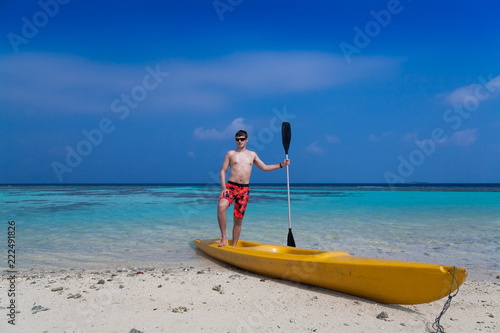 Maldives   man in canoe