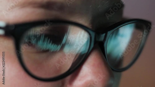 Wallpaper Mural eyes of a girl with glasses look at a monitor close-up Torontodigital.ca