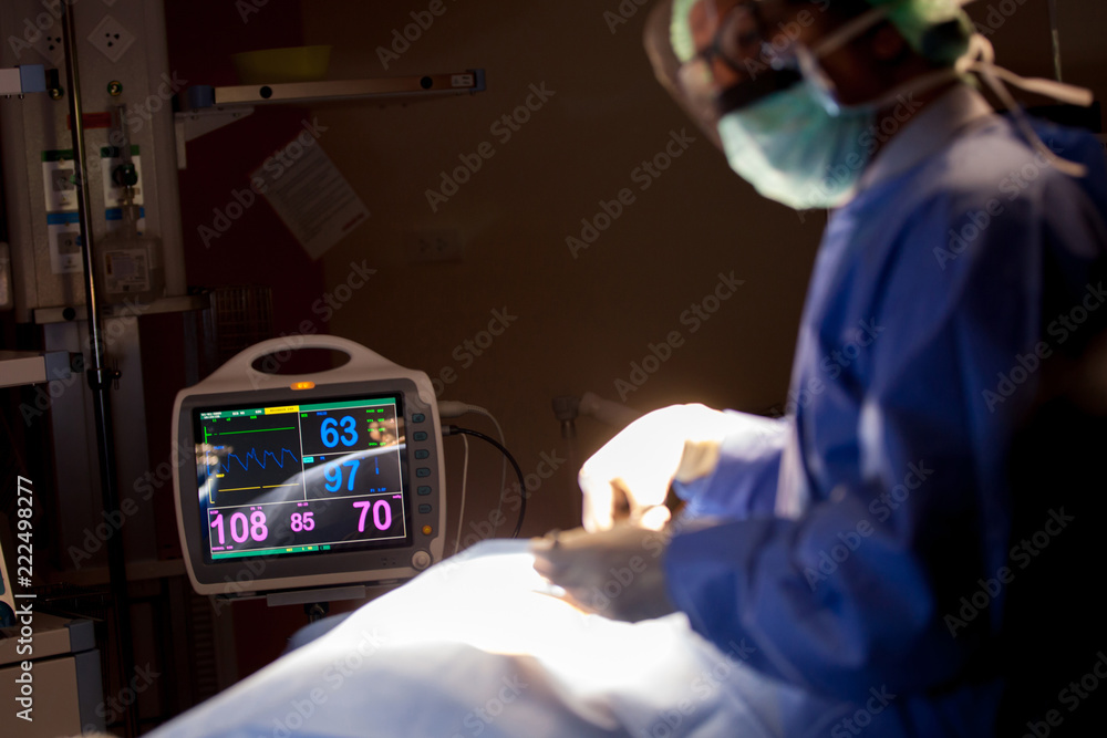 Heart monitor measuring vital signs. heart rate monitor in hospital theater Heart monitor measuring vital signs. heart rate monitor in hospital theater
