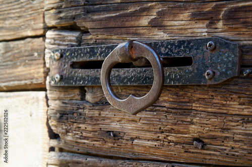 Antique door - handle on old wooden entrance door