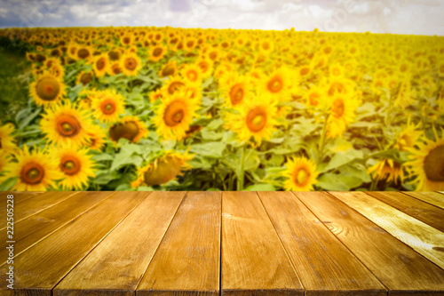 beautiful sunflowers and an old wooden table 