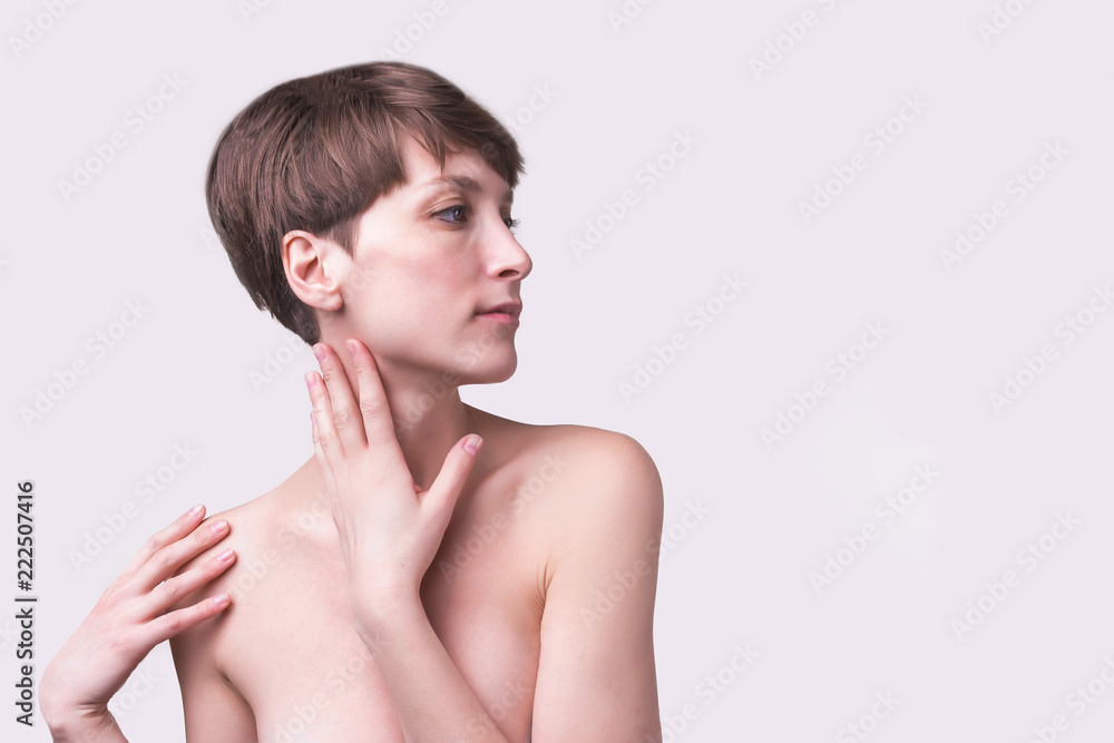 Beautiful woman. Female face close up. Portrait of young caucasian woman at studio isolated on white. Fresh skin and beauty concept. Short haircut, long neck, perfect skin Beautiful woman. Female face close up. Portrait of young caucasian woman at studio isolated on white. Fresh skin and beauty concept. Short haircut, long neck, perfect skin