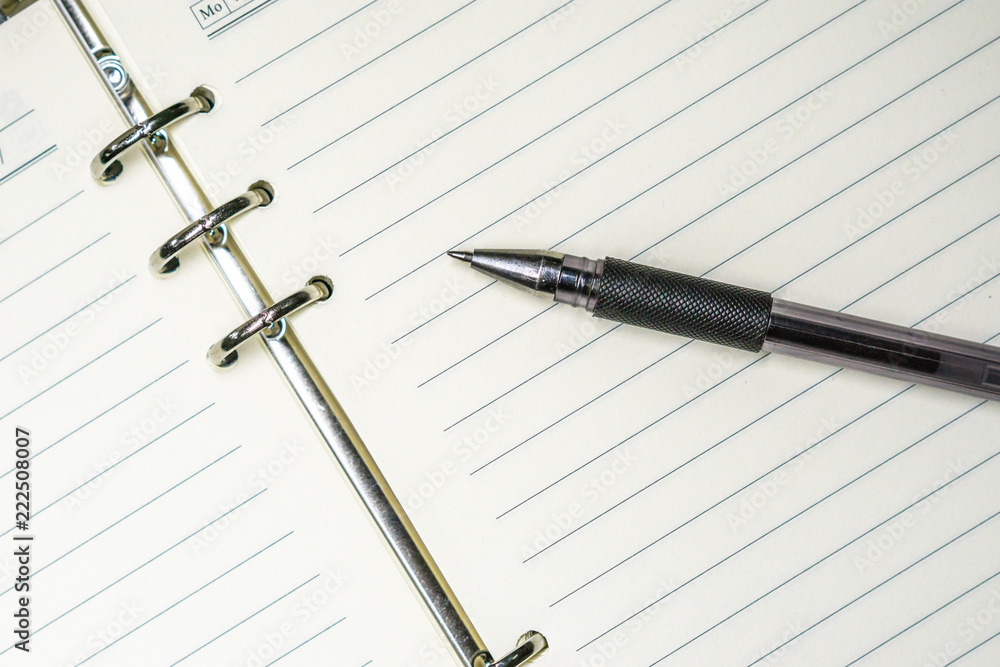 notebook and pen on white background notebook and pen on white background