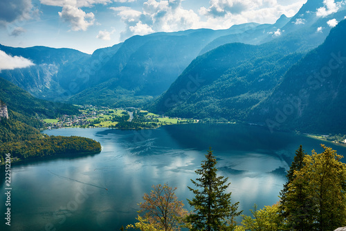 Top view of the landscape around Lake Hallstatt with mountains, forest and blue sky