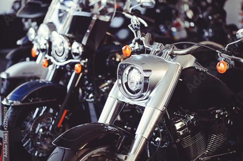 Sale of new motorcycles from the dealer. motorcycles stand in a row sparkle