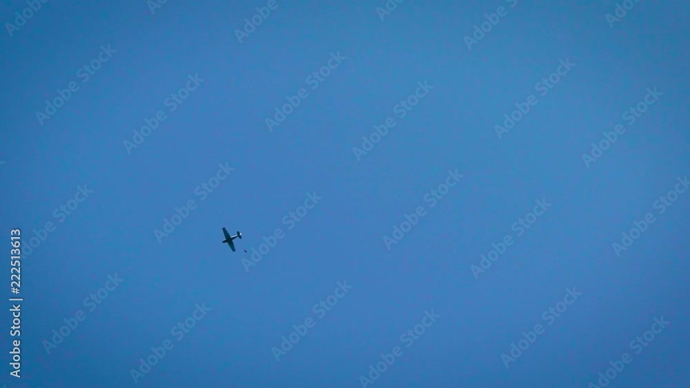 Professional skydiver jumps out of the flying plane, outdoor activity. Professional skydiver jumps out of the flying plane, outdoor activity.