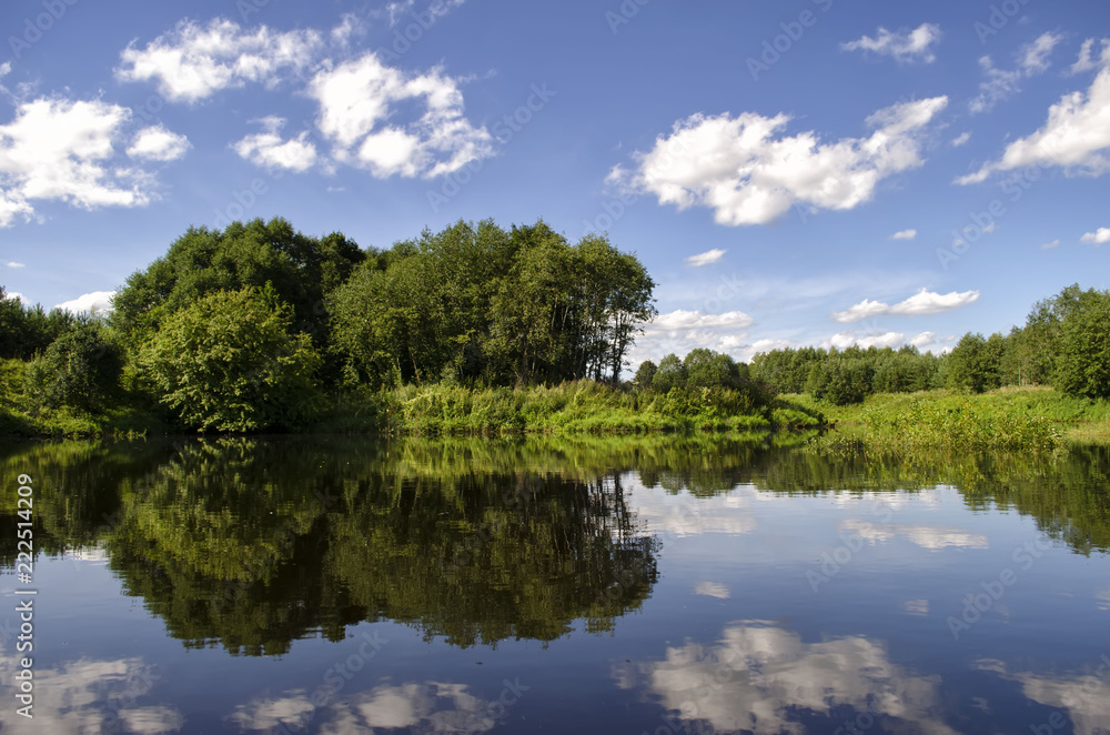 a big river around trees and greens a big river around trees and greens