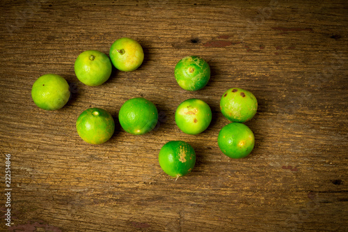 lime on choppping board wood on wood. wood background