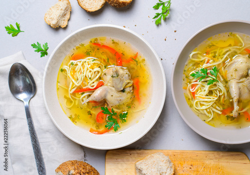 Quail Noodle Soup, Homemade Broth with Noodles and Vegetables Served with Bread Rolls, Zama, Traditional Moldavian and Romanian Soup photo