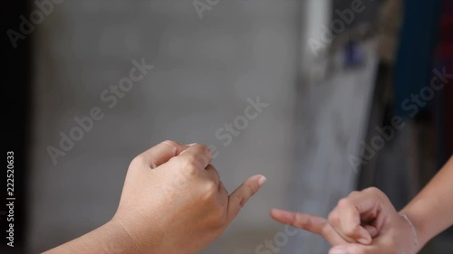 Hand of girl and young woman be hand in hand metaphor contact commitment and promise