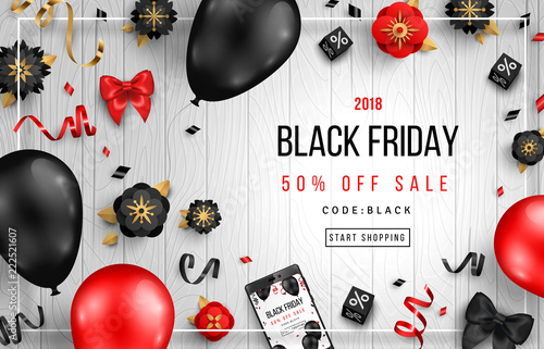 Black Friday on Wooden Background