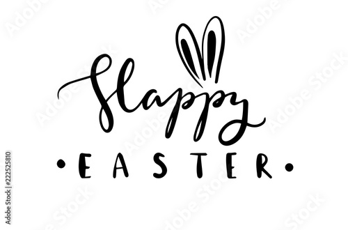 easter theme . black ink handdrawn text- happy easter with bunny ears