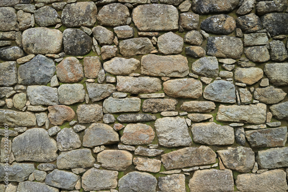Remains of Ancient Inca Stone Wall in Machu Picchu, UNESCO World Heritage Site in Cusco Region, Peru Remains of Ancient Inca Stone Wall in Machu Picchu, UNESCO World Heritage Site in Cusco Region, Peru