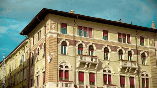 Windows and walls in the old streets in Italy. Architecture of the old European city. Trieste, Italy.