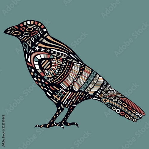 Black raven with colorful abstract pattern on body.