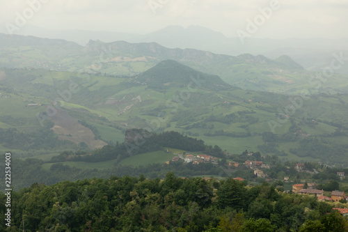 Fototapeta Naklejka Na Ścianę i Meble -  Fog over village at hills