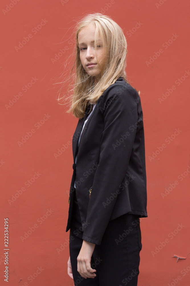 Portrait of a young smiling woman isolated on background with copy space Portrait of a young smiling woman isolated on background with copy space