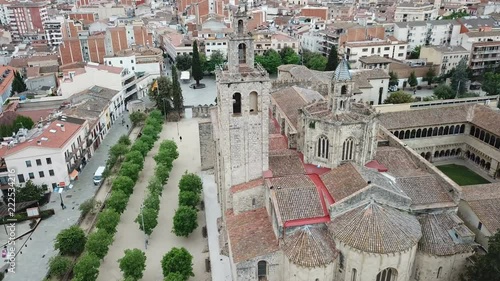 View from drone of ancient Benedictine abbey in Sant Cugat del Valles, Catalonia, Spain photo