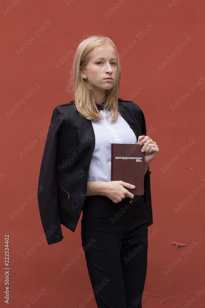 Portrait of a young smiling woman isolated on background with copy space Portrait of a young smiling woman isolated on background with copy space