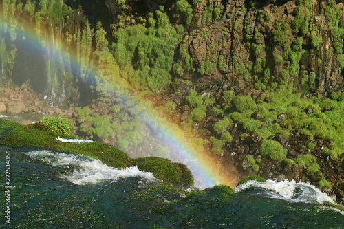 Impressive view of a huge rainbow over the Iguazu falls  Foz do Iguacu  Brazil  South America