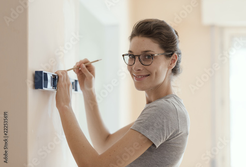 Woman working with a spirit level