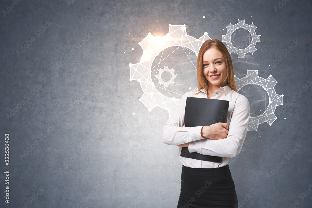 Cheerful businesswoman, cogwheels, gray wall Cheerful businesswoman, cogwheels, gray wall
