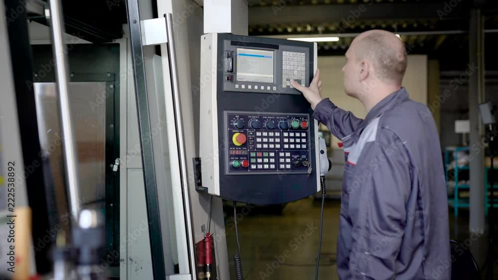 Worker using instrument display Worker using instrument display