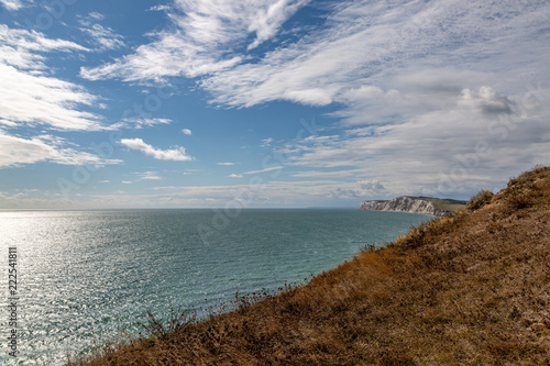 Looking across to Freshwater bay and Tennyson Down on the Isle of Wight, from a coastal path photo