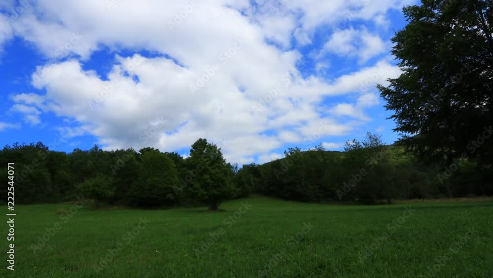Time lapse of meadow with moving clouds in Pyrenees, Aude in the southern of France
Time lapse of meadow with moving clouds in Pyrenees, Aude in the southern of France