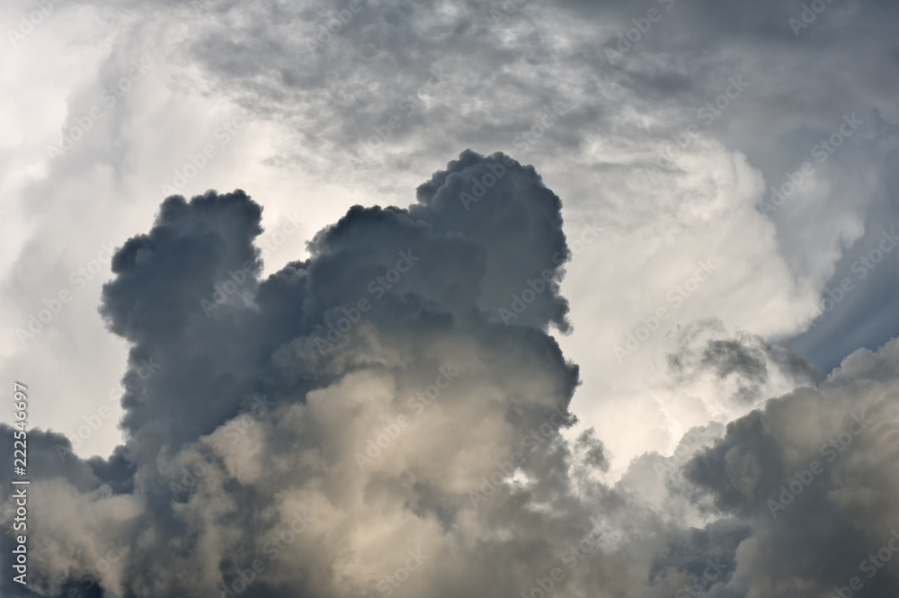 Approaching thunderstorm with dark clouds in the sky. Approaching thunderstorm with dark clouds in the sky.