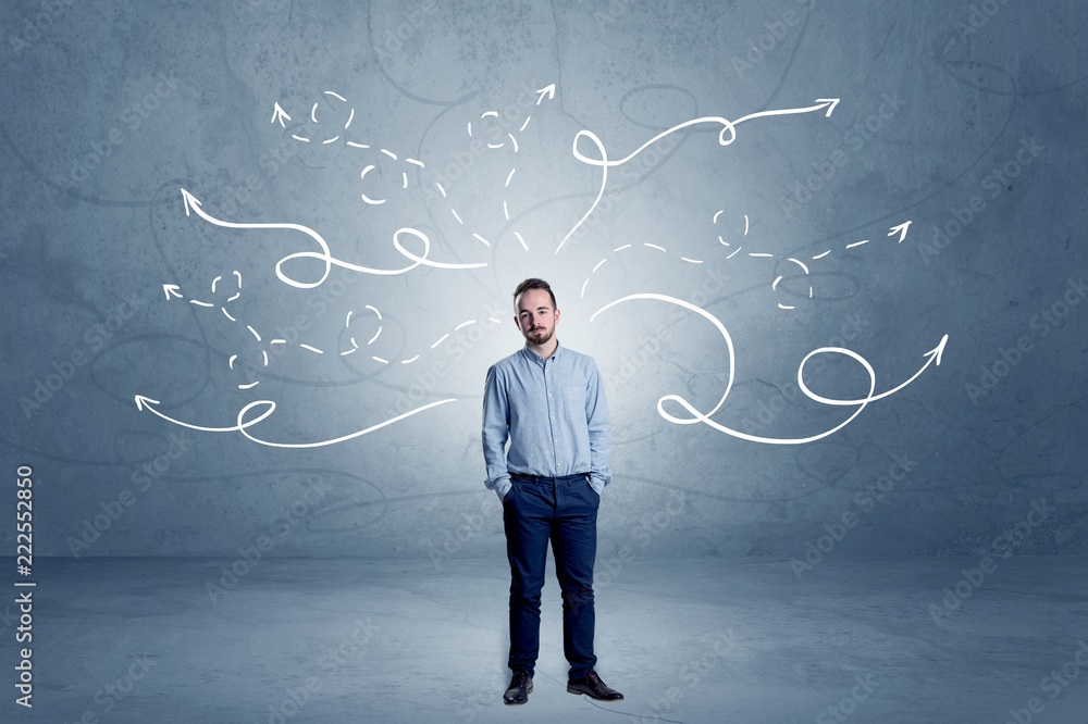 Elegant businessman choosing between directions with winding drawn arrows around
Elegant businessman choosing between directions with winding drawn arrows around