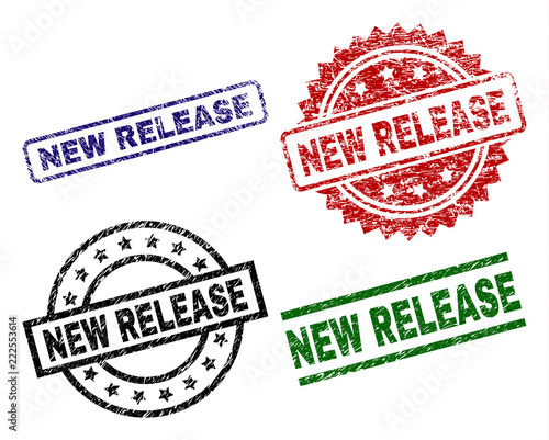 NEW RELEASE seal prints with distress texture. Black, green,red,blue vector rubber prints of NEW RELEASE title with dirty surface. Rubber seals with circle, rectangle, rosette shapes.