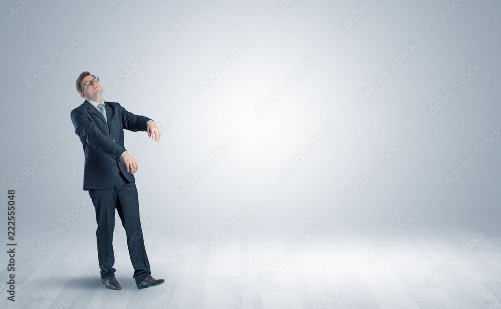 Zombi, sleepy maniac businessman walking in a copy space
Zombi, sleepy maniac businessman walking in a copy space