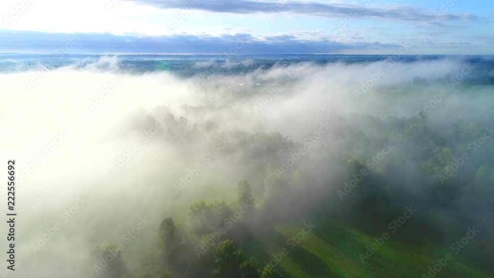 Stunning misty rural landscape at dawn, aerial view.
Stunning misty rural landscape at dawn, aerial view.