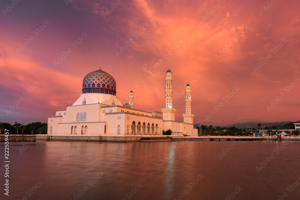 Kota Kinabalu Floating mosque with dramatics clouds during sunset , Beautiful sunset at Kota Kinabalu City Mosque Sabah Borneo, Malaysia