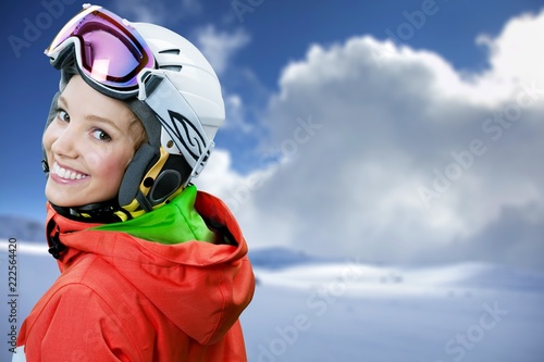 Happy Young Female Snowboarder on Background © BillionPhotos.com