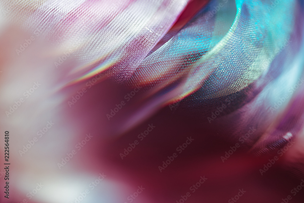 Blurry extreme close up macro of chiffon fabric. Beautiful sensual shapes colorful background. Real optical bokeh effect. Soft, delicate gentle pastel colors. Elegant decorative mesh textile backdrop - obrazy, fototapety, plakaty 