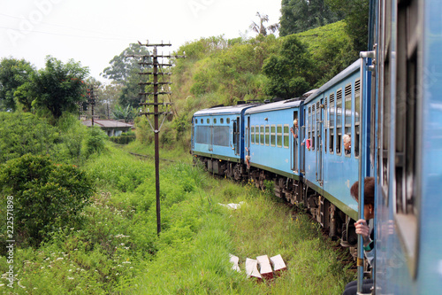 Tourists feeling happy along the way on the scenic blue train to Ella