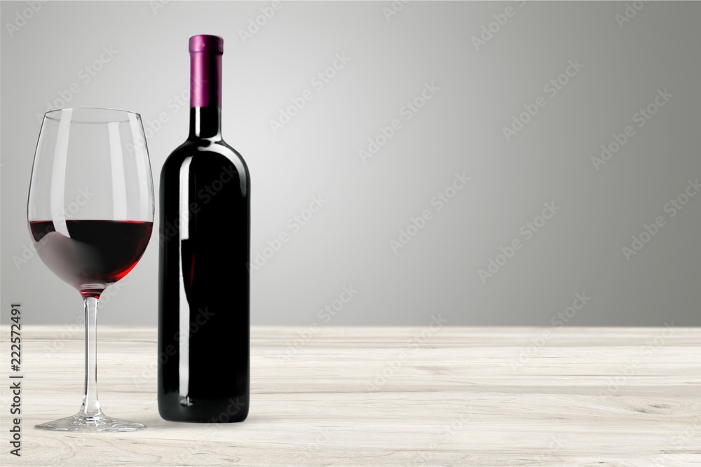 Red wine glass and bootle with shadow Red wine glass and bootle with shadow