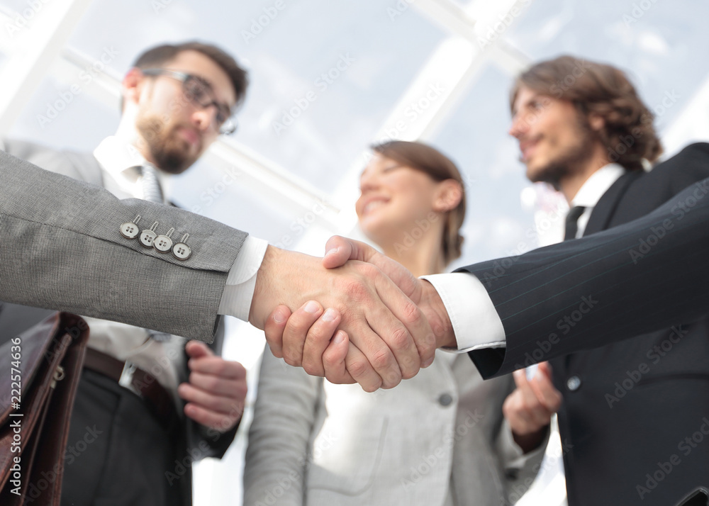 in the foreground.handshake of business partners in the foreground.handshake of business partners