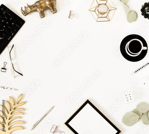 Obraz na plátně Creative home office desk workspace, composition mock up,  cup of coffee, keyboard, blanket,  eucalyptus branches, different subjects on white background